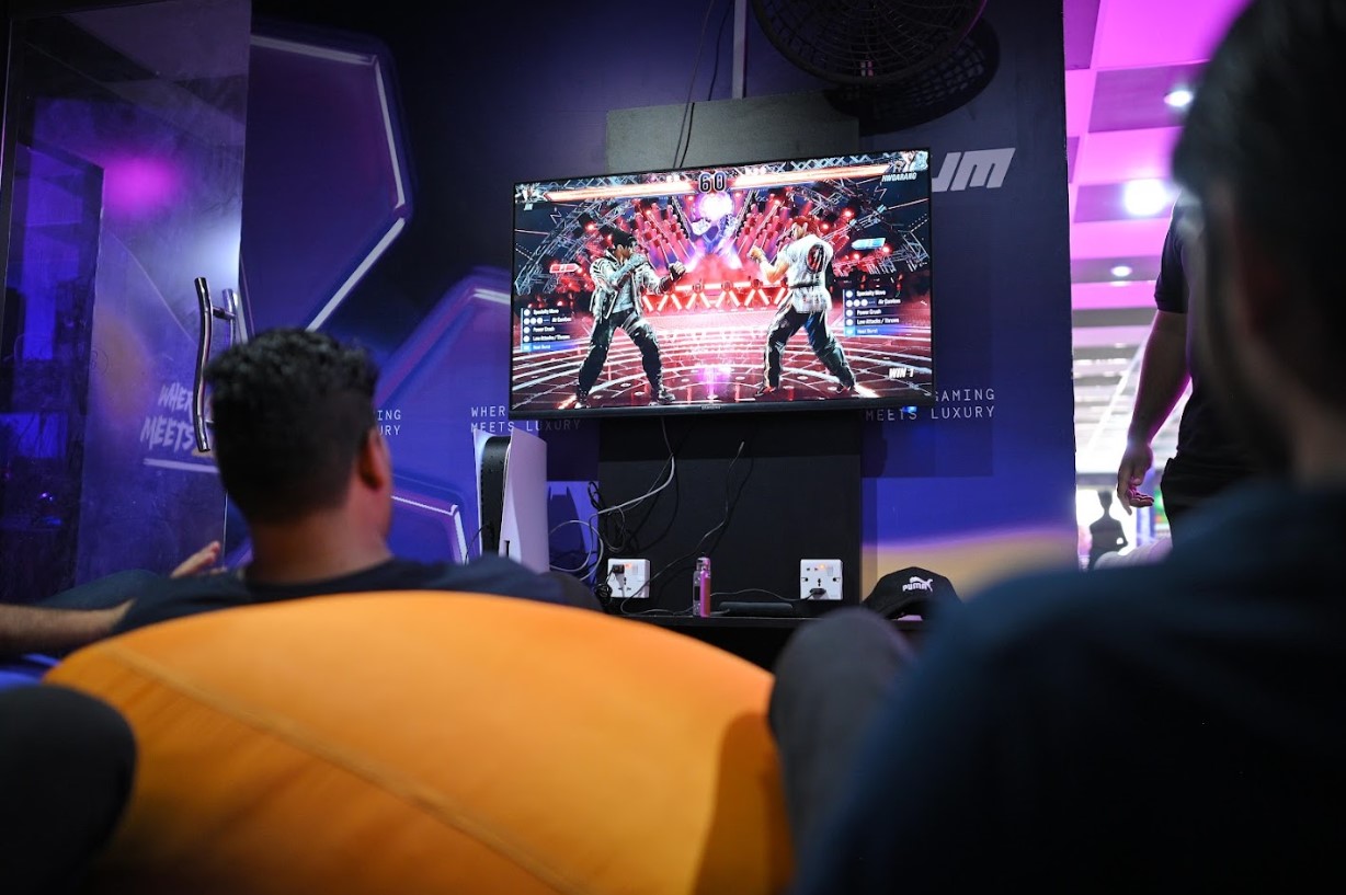 Console gaming section with players